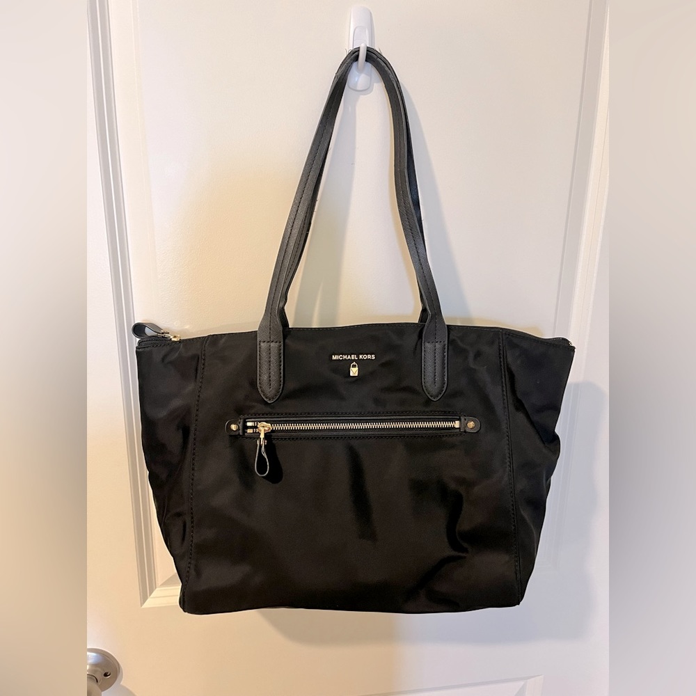 Michael Kors black travel bag/purse. Used.